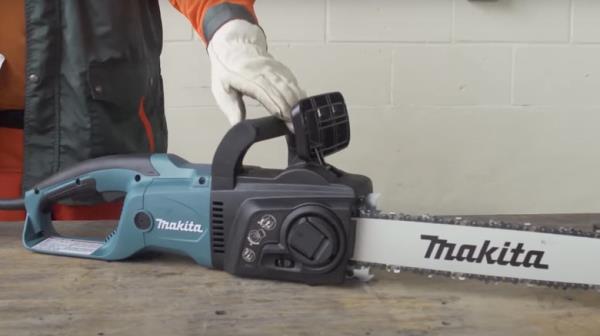 Makita chainsaw sitting on a table