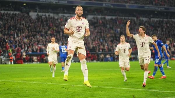 Harry Kane celebrates Bayern Munich's sixth goal of the night