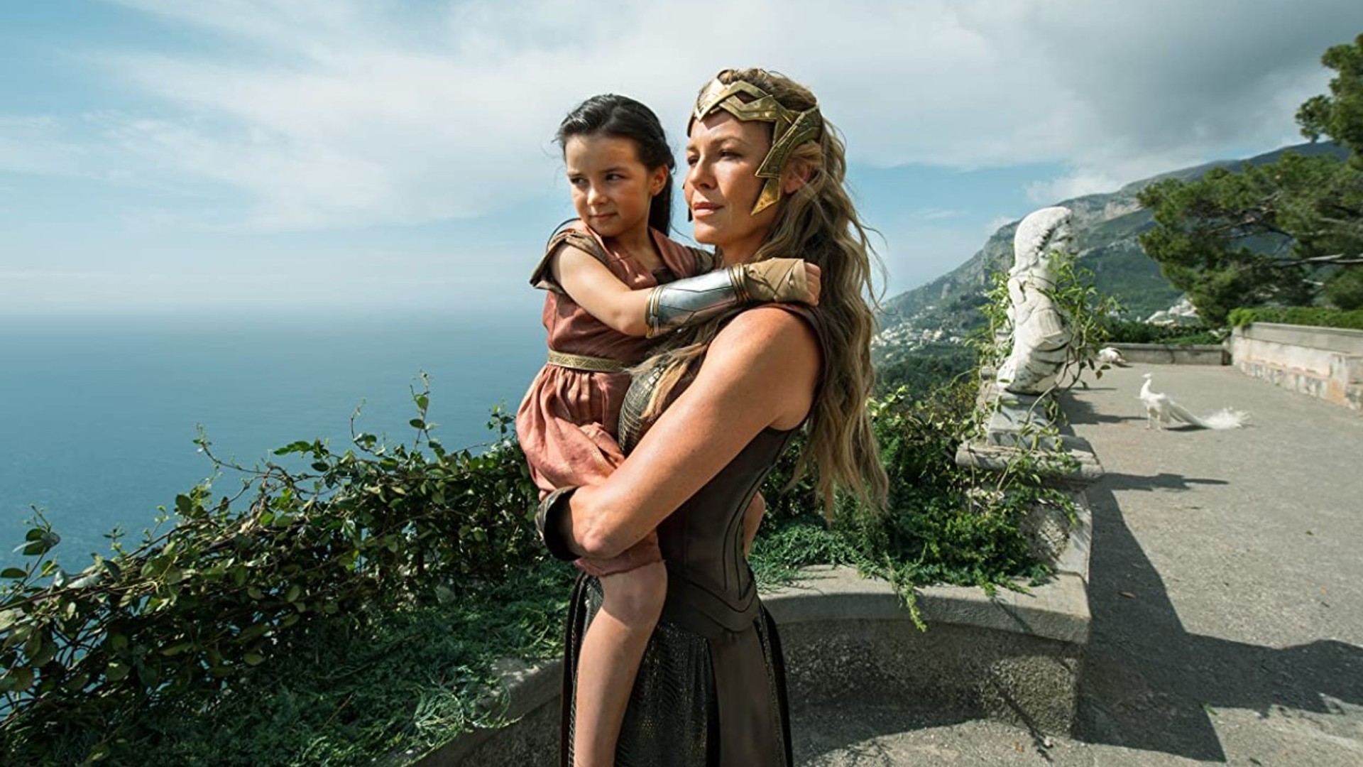 Co<em></em>nnie Nielsen as Queen Hippolyta and Lilly Aspell as Diana in Wo<em></em>nder Woman (2017)